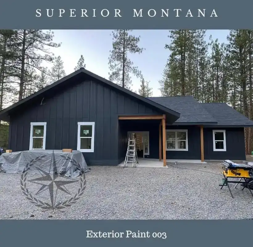 Board-and-batten exterior finished in dark paint, Superior, Montana
