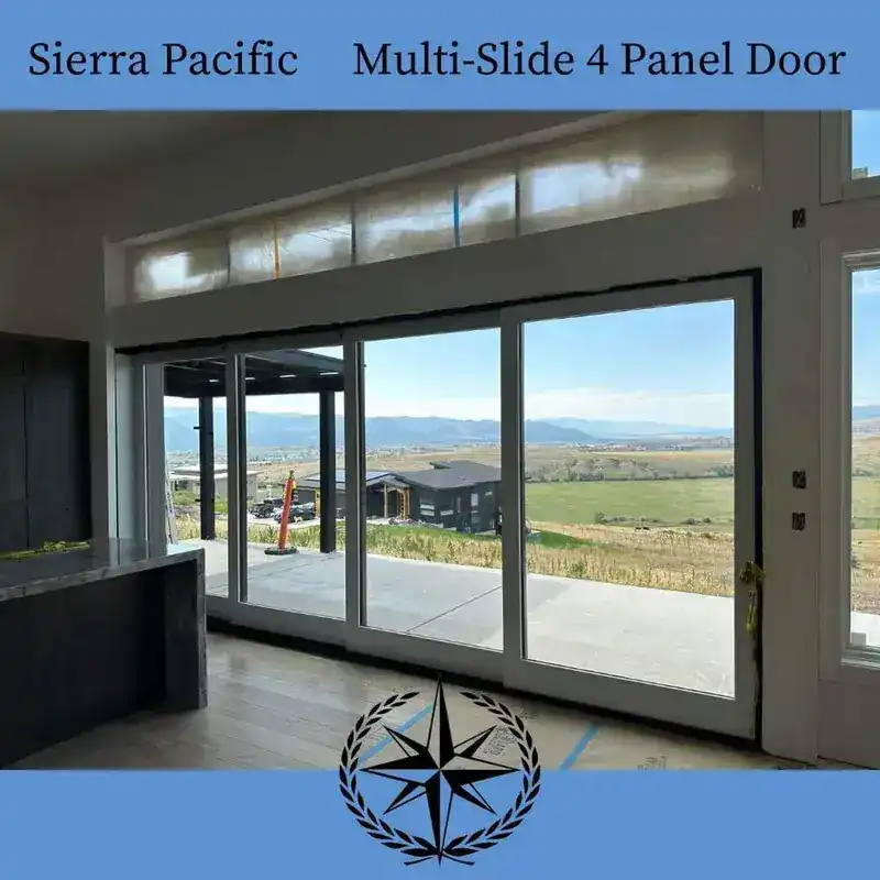 Looking out through the installed multi-slide door to the valley