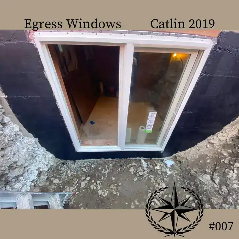 The new egress window set into the cut opening