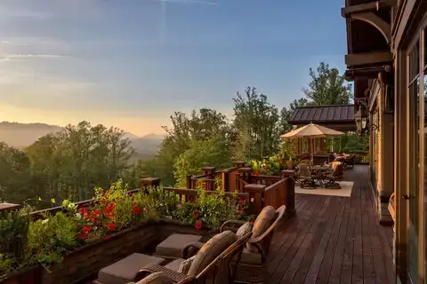 Timber deck with built-in planters overlooking the hills