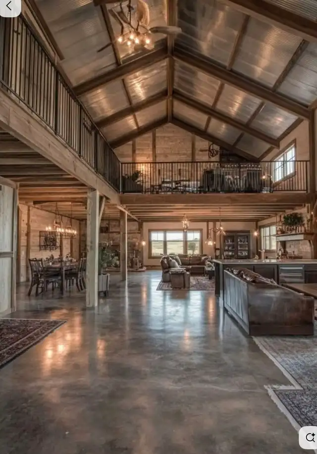 Open-plan barndominium interior with timber posts
