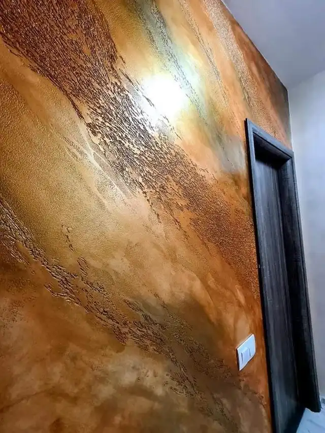 Burnished copper plaster finish