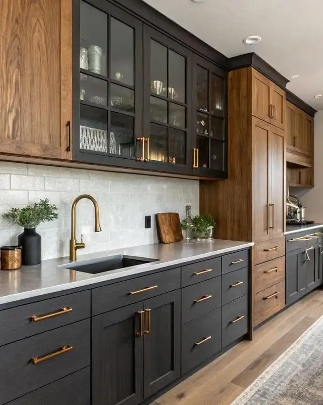 Kitchen with wood and charcoal cabinets and a white backsplash