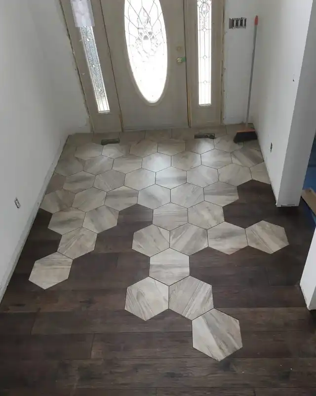 Hexagonal tile meeting wide-plank wood flooring