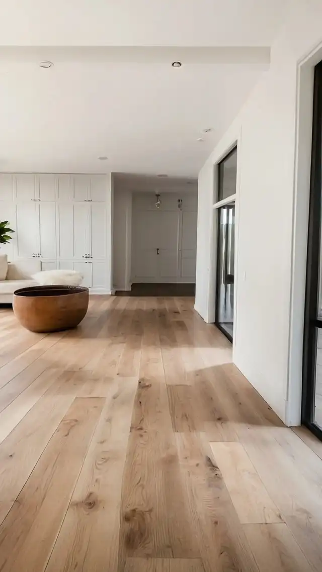Wide-plank hardwood through a hallway