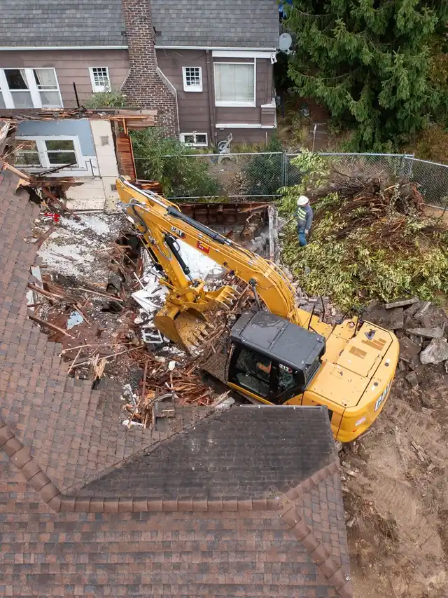 Excavator on a demolition site, from above